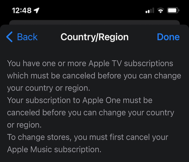 Image showing message indicating Apple accounts must be cancelled before switching regions